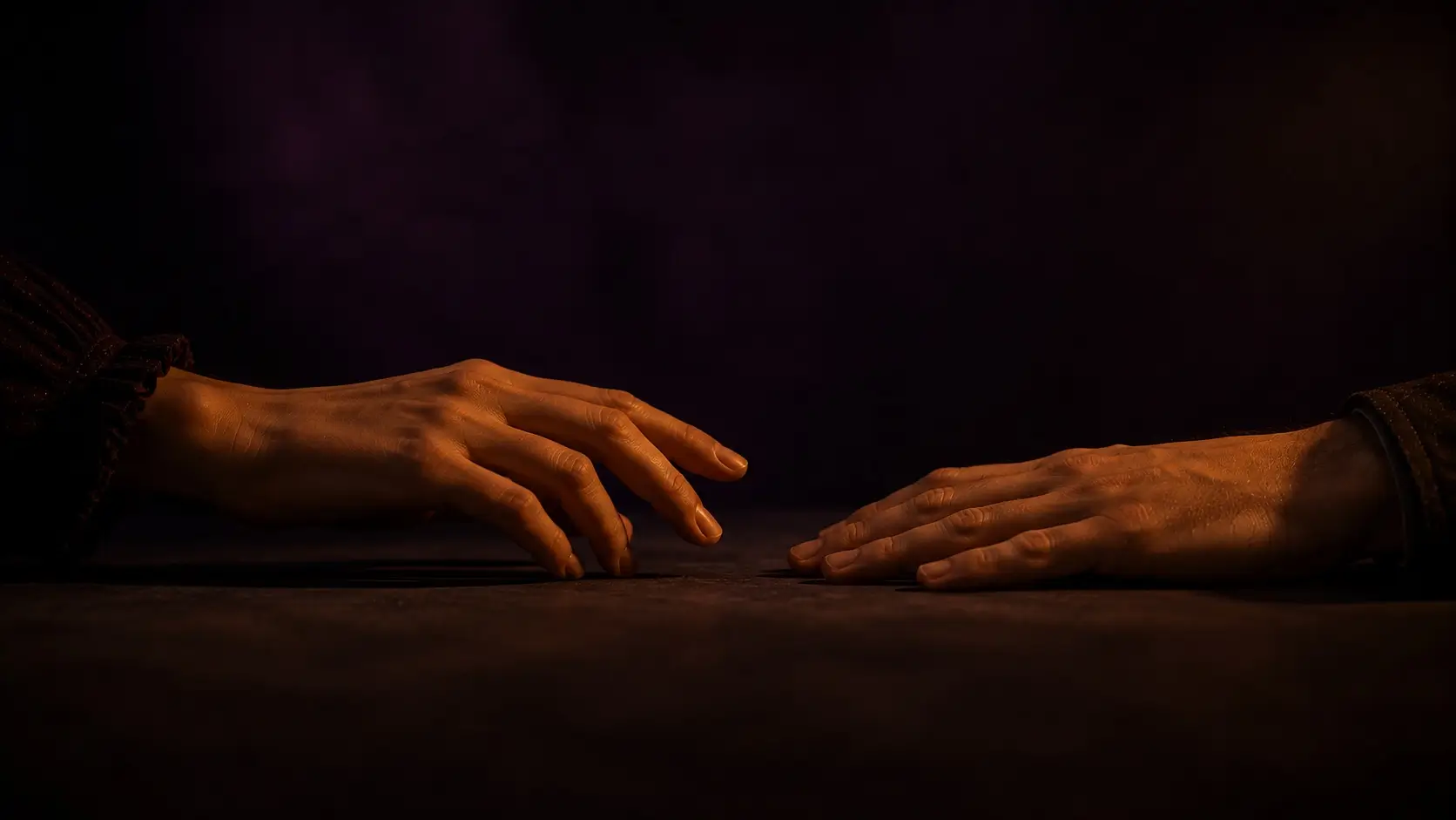 Cancer and aquarius compatibility — two hands almost touching on a dark surface, a candle casting warm light, the space between them unresolved